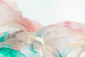 Painting created with alcohol ink. Soft smooth color transitions combined with clear gold and silver edges. Blue, pink, green abstract color combination. photo