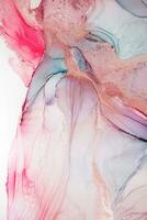 Painting created with alcohol ink. Soft smooth color transitions combined with clear gold and silver edges. Blue, pink, green abstract color combination. photo