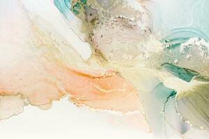 Painting created with alcohol ink. Soft smooth color transitions combined with clear gold and silver edges. Blue, pink, green abstract color combination. photo