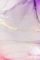 Painting created with alcohol ink. Soft smooth color transitions combined with clear gold and silver edges. Blue, pink, green abstract color combination. photo