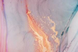 Painting created with alcohol ink. Soft smooth color transitions combined with clear gold and silver edges. Blue, pink, green abstract color combination. photo