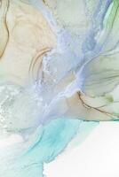 Painting created with alcohol ink. Soft smooth color transitions combined with clear gold and silver edges. Blue, pink, green abstract color combination. photo