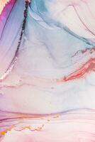 Painting created with alcohol ink. Soft smooth color transitions combined with clear gold and silver edges. Blue, pink, green abstract color combination. photo
