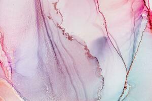 Painting created with alcohol ink. Soft smooth color transitions combined with clear gold and silver edges. Blue, pink, green abstract color combination. photo