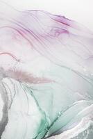 Painting created with alcohol ink. Soft smooth color transitions combined with clear gold and silver edges. Blue, pink, green abstract color combination. photo