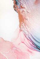 Painting created with alcohol ink. Soft smooth color transitions combined with clear gold and silver edges. Blue, pink, green abstract color combination. photo