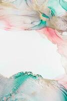 Painting created with alcohol ink. Soft smooth color transitions combined with clear gold and silver edges. Blue, pink, green abstract color combination. photo