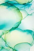 Painting created with alcohol ink. Soft smooth color transitions combined with clear gold and silver edges. Blue, pink, green abstract color combination. photo