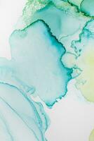 Painting created with alcohol ink. Soft smooth color transitions combined with clear gold and silver edges. Blue, pink, green abstract color combination. photo
