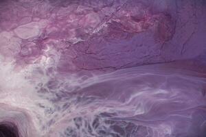 haze on a black background. Part of original alcohol ink painting. Modern art. Abstract colorful background, wallpaper. Marble texture. Fluid Art. photo