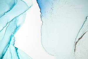 Abstract liquid painting background alcohol ink technique. the abstract ocean includes swirls of marble or ripples of agate. Luxurious fluid painting. photo