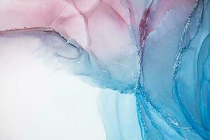 Painting created with alcohol ink. Soft smooth color transitions combined with clear gold and silver edges. Blue, pink, green abstract color combination. photo