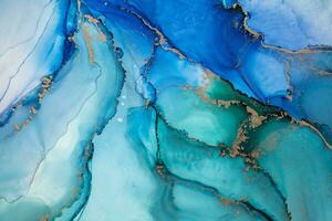 Painting created with alcohol ink. Soft smooth color transitions combined with clear gold and silver edges. Blue, pink, green abstract color combination. photo