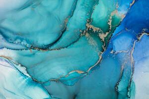 Painting created with alcohol ink. Soft smooth color transitions combined with clear gold and silver edges. Blue, pink, green abstract color combination. photo