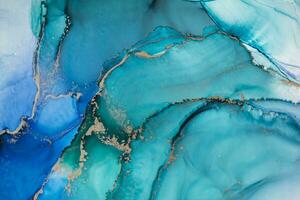 Painting created with alcohol ink. Soft smooth color transitions combined with clear gold and silver edges. Blue, pink, green abstract color combination. photo