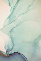 Painting created with alcohol ink. Soft smooth color transitions combined with clear gold and silver edges. Blue, pink, green abstract color combination. photo