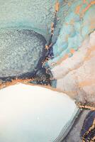 Painting created with alcohol ink. Soft smooth color transitions combined with clear gold and silver edges. Blue, pink, green abstract color combination. photo