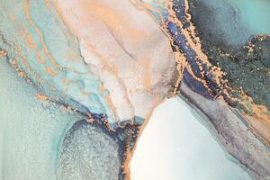 Painting created with alcohol ink. Soft smooth color transitions combined with clear gold and silver edges. Blue, pink, green abstract color combination. photo