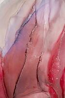 Painting created with alcohol ink. Soft smooth color transitions combined with clear gold and silver edges. Blue, pink, green abstract color combination. photo