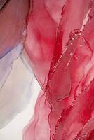 Painting created with alcohol ink. Soft smooth color transitions combined with clear gold and silver edges. Blue, pink, green abstract color combination. photo