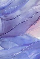 Painting created with alcohol ink. Soft smooth color transitions combined with clear gold and silver edges. Blue, pink, green abstract color combination. photo