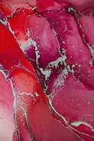 Painting created with alcohol ink. Soft smooth color transitions combined with clear gold and silver edges. Blue, pink, green abstract color combination. photo