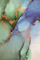 Painting created with alcohol ink. Soft smooth color transitions combined with clear gold and silver edges. Blue, pink, green abstract color combination. photo