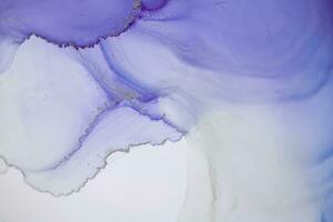 Painting created with alcohol ink. Soft smooth color transitions combined with clear gold and silver edges. Blue, pink, green abstract color combination. photo