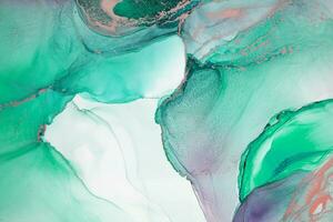 Painting created with alcohol ink. Soft smooth color transitions combined with clear gold and silver edges. Blue, pink, green abstract color combination. photo