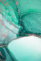 Painting created with alcohol ink. Soft smooth color transitions combined with clear gold and silver edges. Blue, pink, green abstract color combination. photo