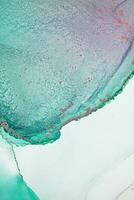 Painting created with alcohol ink. Soft smooth color transitions combined with clear gold and silver edges. Blue, pink, green abstract color combination. photo