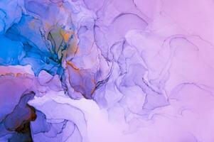 Abstract created using the technique of Alcohol ink. Macro photography of the smallest details of a panting. The panting shows how overflows of shades and colors of paint resemble space motifs. photo