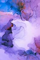 Abstract created using the technique of Alcohol ink. Macro photography of the smallest details of a panting. The panting shows how overflows of shades and colors of paint resemble space motifs. photo