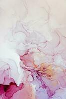 Abstract created using the technique of Alcohol ink. Macro photography of the smallest details of a panting. The panting shows how overflows of shades and colors of paint resemble space motifs. photo