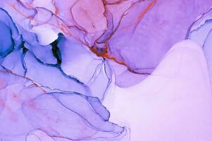 Abstract created using the technique of Alcohol ink. Macro photography of the smallest details of a panting. The panting shows how overflows of shades and colors of paint resemble space motifs. photo