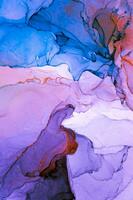 Abstract created using the technique of Alcohol ink. Macro photography of the smallest details of a panting. The panting shows how overflows of shades and colors of paint resemble space motifs. photo