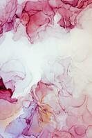 Abstract created using the technique of Alcohol ink. Macro photography of the smallest details of a panting. The panting shows how overflows of shades and colors of paint resemble space motifs. photo