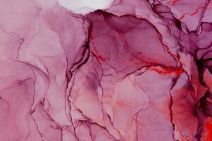 Abstract created using the technique of Alcohol ink. Macro photography of the smallest details of a panting. The panting shows how overflows of shades and colors of paint resemble space motifs. photo