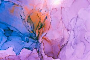 Abstract created using the technique of Alcohol ink. Macro photography of the smallest details of a panting. The panting shows how overflows of shades and colors of paint resemble space motifs. photo