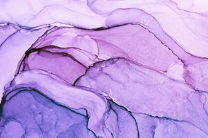 Abstract created using the technique of Alcohol ink. Macro photography of the smallest details of a panting. The panting shows how overflows of shades and colors of paint resemble space motifs. photo