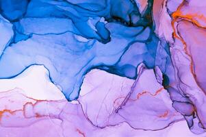 Abstract created using the technique of Alcohol ink. Macro photography of the smallest details of a panting. The panting shows how overflows of shades and colors of paint resemble space motifs. photo