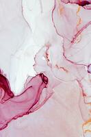 Abstract created using the technique of Alcohol ink. Macro photography of the smallest details of a panting. The panting shows how overflows of shades and colors of paint resemble space motifs. photo