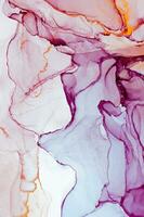 Abstract created using the technique of Alcohol ink. Macro photography of the smallest details of a panting. The panting shows how overflows of shades and colors of paint resemble space motifs. photo
