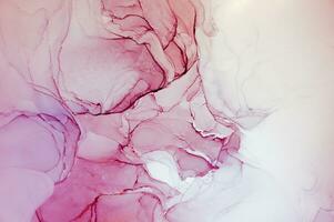 Abstract created using the technique of Alcohol ink. Macro photography of the smallest details of a panting. The panting shows how overflows of shades and colors of paint resemble space motifs. photo