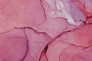 Abstract created using the technique of Alcohol ink. Macro photography of the smallest details of a panting. The panting shows how overflows of shades and colors of paint resemble space motifs. photo