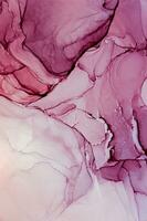 Abstract created using the technique of Alcohol ink. Macro photography of the smallest details of a panting. The panting shows how overflows of shades and colors of paint resemble space motifs. photo