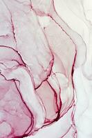 Abstract created using the technique of Alcohol ink. Macro photography of the smallest details of a panting. The panting shows how overflows of shades and colors of paint resemble space motifs. photo