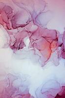 Abstract created using the technique of Alcohol ink. Macro photography of the smallest details of a panting. The panting shows how overflows of shades and colors of paint resemble space motifs. photo