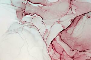Abstract created using the technique of Alcohol ink. Macro photography of the smallest details of a panting. The panting shows how overflows of shades and colors of paint resemble space motifs. photo
