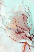 Abstract created using the technique of Alcohol ink. Macro photography of the smallest details of a panting. The panting shows how overflows of shades and colors of paint resemble space motifs. photo